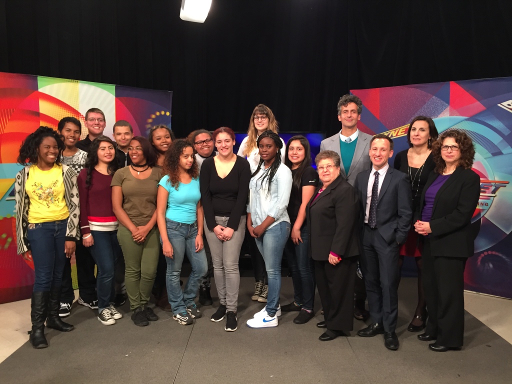 Truman students with experts after the Strike a Chord panel discussion show.  L to R: Quincee Tellis, Mike Ortiz, David Roush (teacher), Sully Alonzo, Sandro Rodriguez, Cleopatra Green, Messiah Banks, Hildanelys Minaya, Nicole Garcia, Rosannie Calderon, Allyee Whaley (Trevor Project), Tyiece Johnson, Daniella Dominguez, Dr. Rosa Gill (Communilife), Michael Max Knobbe (BronxNET), George Bodarky (WFUV), Marisa White (BronxNET), Jill Harkavy-Friedman (Am. Society for Suicide Prevention)