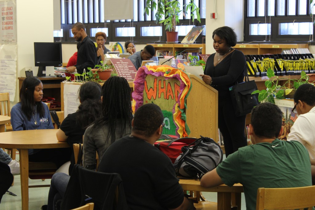 Kinara Joseph-Bolling commands the attention of an entire room of students as she reads her poem on Wednesday.