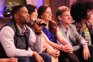 NFL Hall of Famer and television show host Michael Strahan listens closely to a question posed by Truman freshman Dorothy Crisanto.