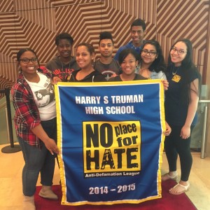 Ysabel, Doneika, Maridalia, Michael, Rene, Stevem, Andrea, and Heidy proudly pose with the 2014-2015 No Place For Hate banner.