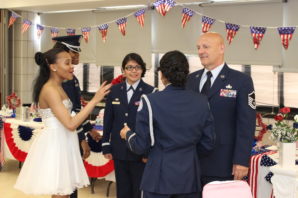 MSgt chats with a few cadets before the formal opening ceremony of the Dining out and Military Ball on Friday.