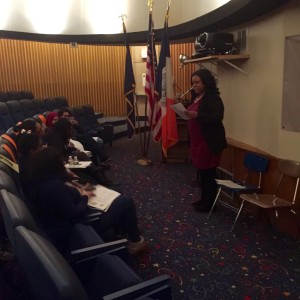 Chandeerah Davis performing a spoken word piece, "On Sisterhood."