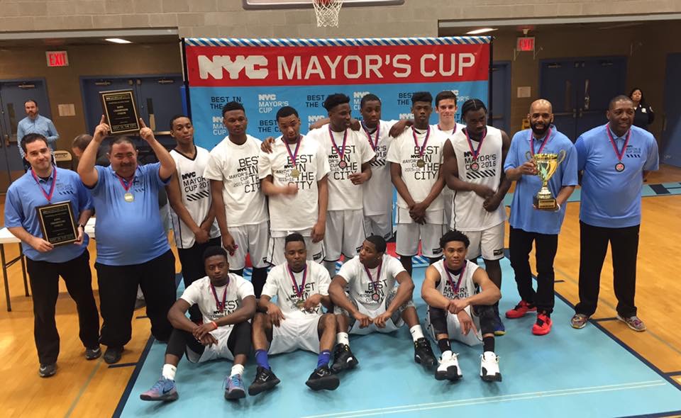 Kevin Dennis (back row, third from right) and Coach Ricardo Furriel (back row, far left) celebrate winning the NYC Mayor's Cup Championship. Kevin was the MVP, scoring 24 points overall.