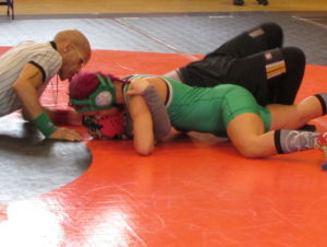 Junior Pearl Fletcher puts her opponent in a tough position at a recent wrestling match.