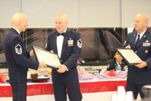 Sgt Daniel P. Anderson of Joint Base McGuire-Dix-Lakehurst, NJ receives certificates of honor from MSgts Persing and Messina.