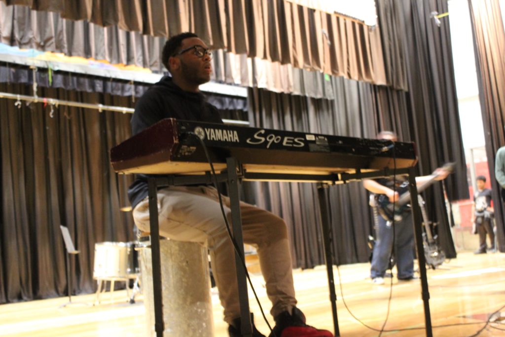 Lester Robinson Jr. Plays the piano while the rock/soul band performs at the winter concert. (Photos by Abel Alexander)